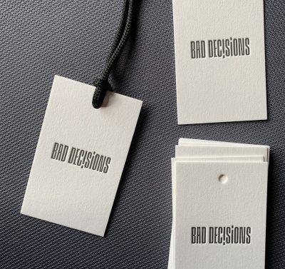 Popierine drabuziu etikete