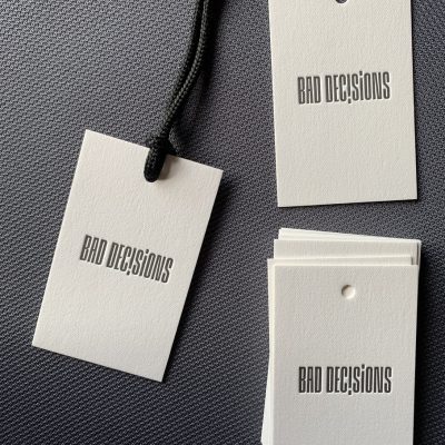 Popierine drabuziu etikete