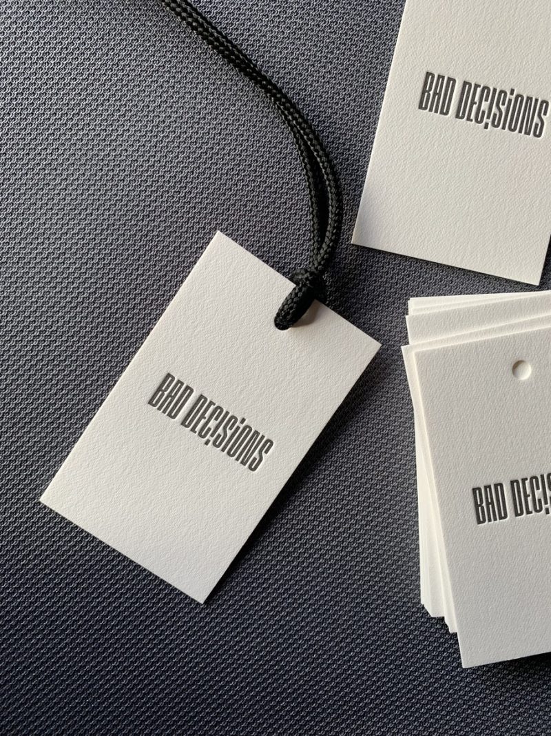 Popierine drabuziu etikete