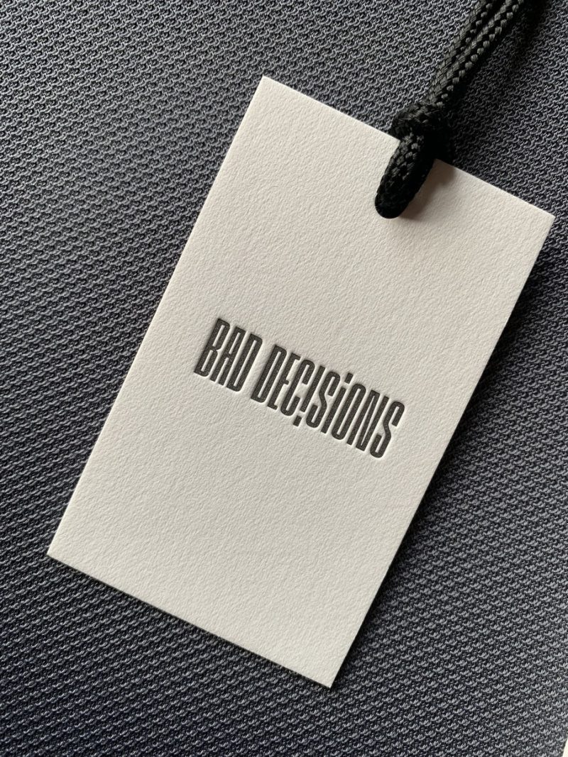 Popierine drabuziu etikete