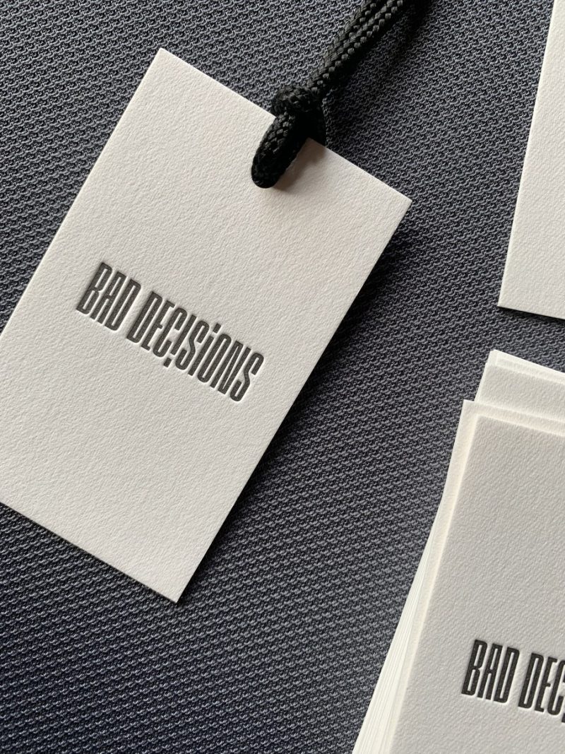 Popierine drabuziu etikete